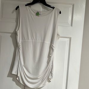 Calvin Klein Top. White. Zips on the side. Slightly Fitted under bodice. XL